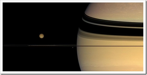 Titan above Saturn's rings